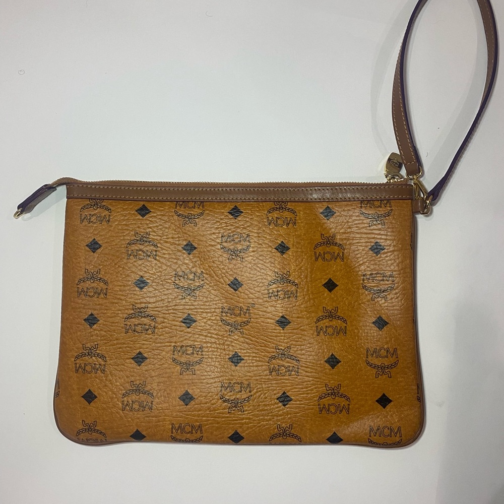 MCM Classic Visetos Pouch/Clutch with wristlet band.